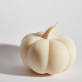 Close-up of Boujie Life Size Pumpkin Decorative Candle, hand-poured soy wax with textured pumpkin detail.